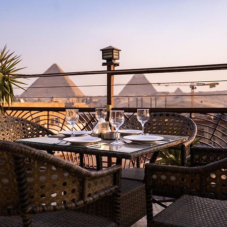 Pyramids Gem Plaza Powered By Look Hotel Cairo Exterior photo