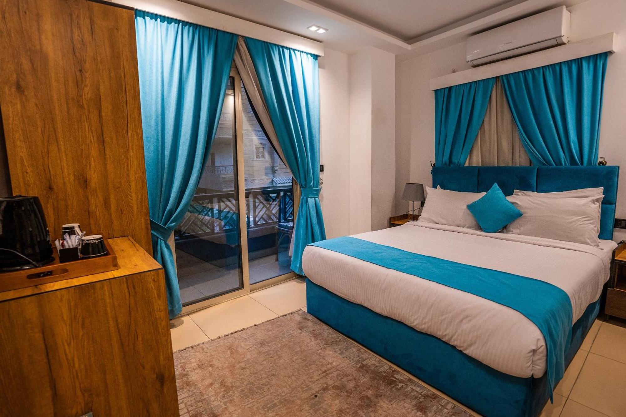 Pyramids Gem Plaza Hotel Kafrat al Jabal Exterior photo